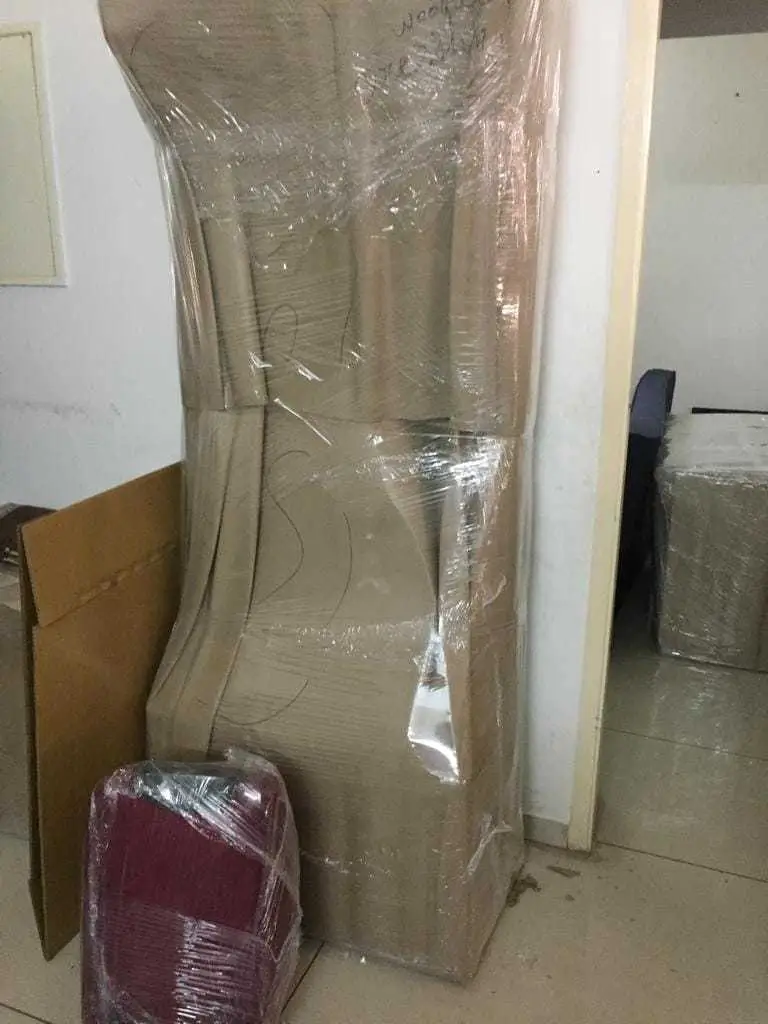 Professional packing team in Madurai using bubble wrap and cartons