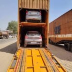Cars loaded inside a vehicle transport container for transportation from Paramakudi