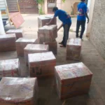 Carton boxes numbered before loading for house shifting in Paramakudi