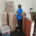 Professionally packed household furniture and cartons ready for loading during house shifting in Madurai